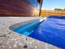 Non-slip concrete pool surround