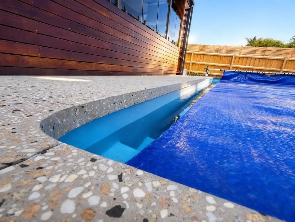 Non-slip concrete pool surround