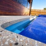 Concrete pool edge with cover