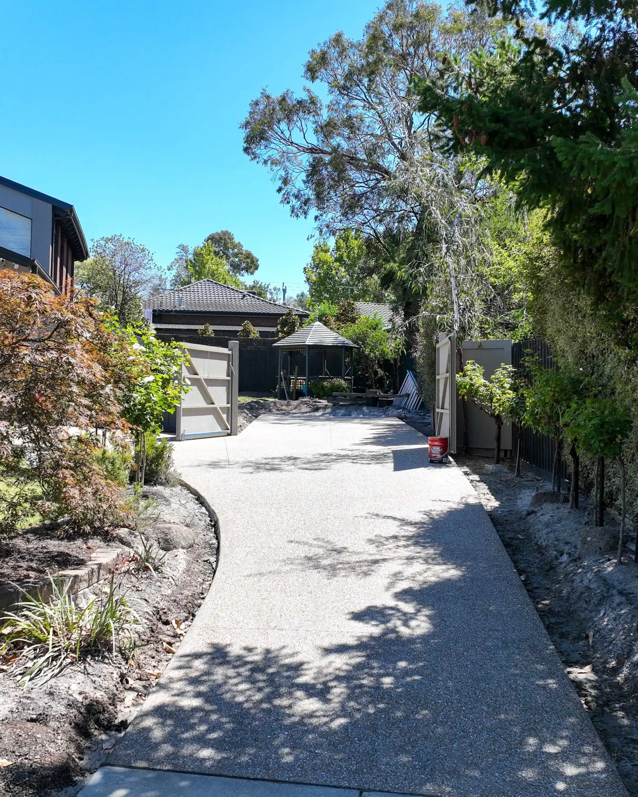 Gravel driveway with gazebo