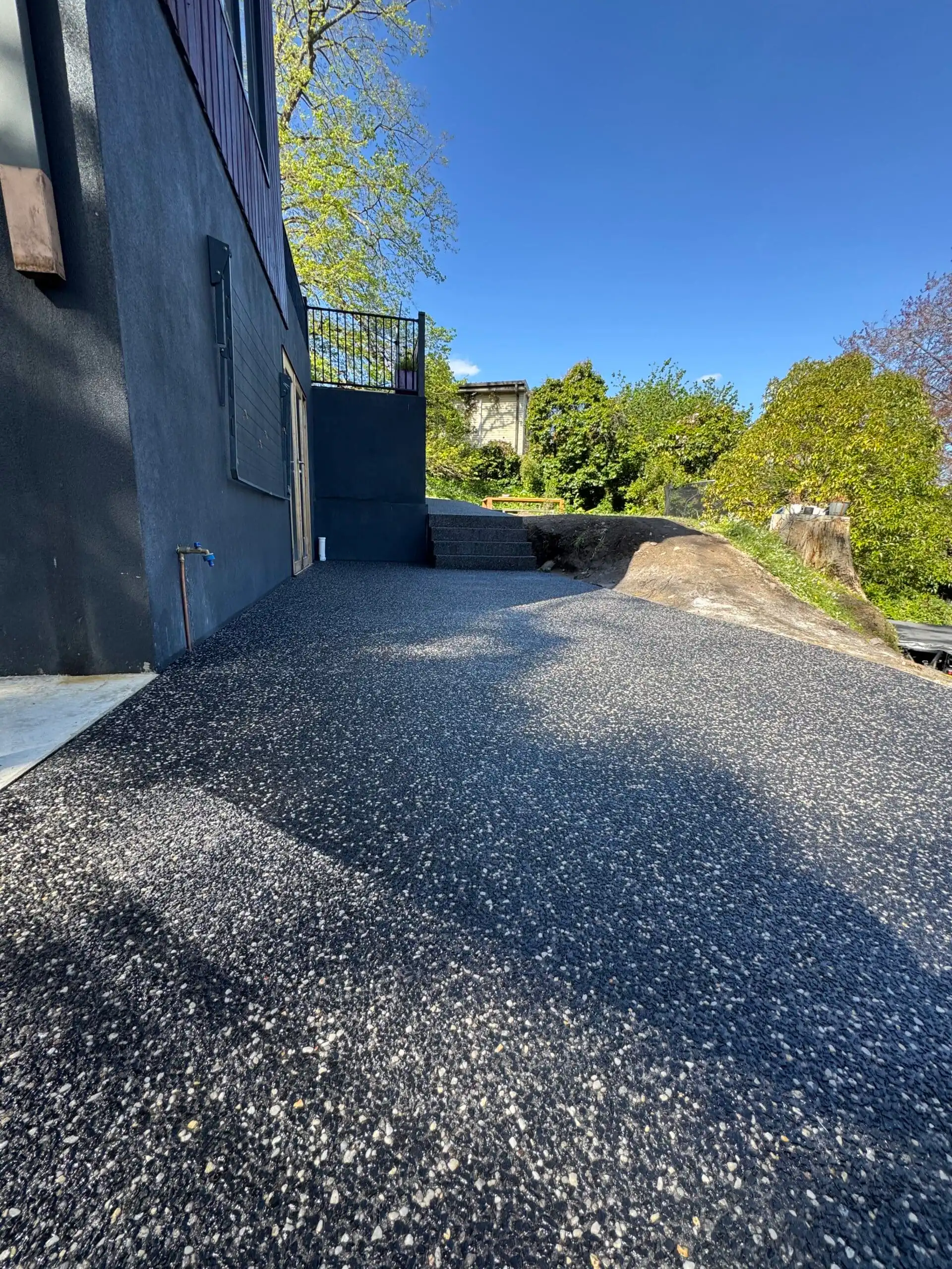 New asphalt driveway installation